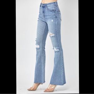 Risen Jeans Light Wash Raw Hem Flare